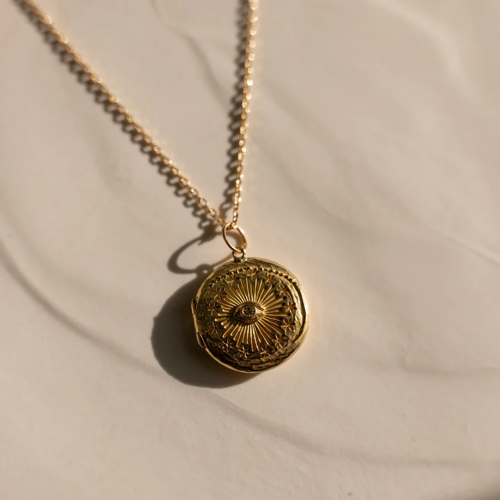 Cosmic Eye locket with a Diamond